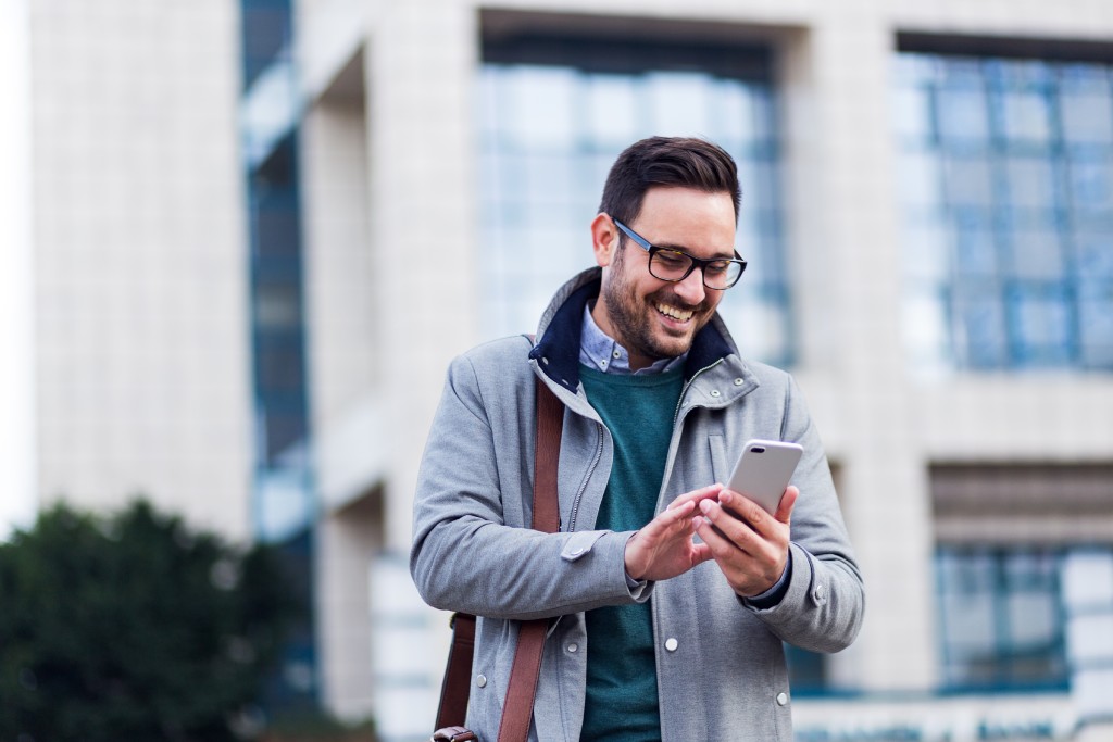 Businessman using his smartphone